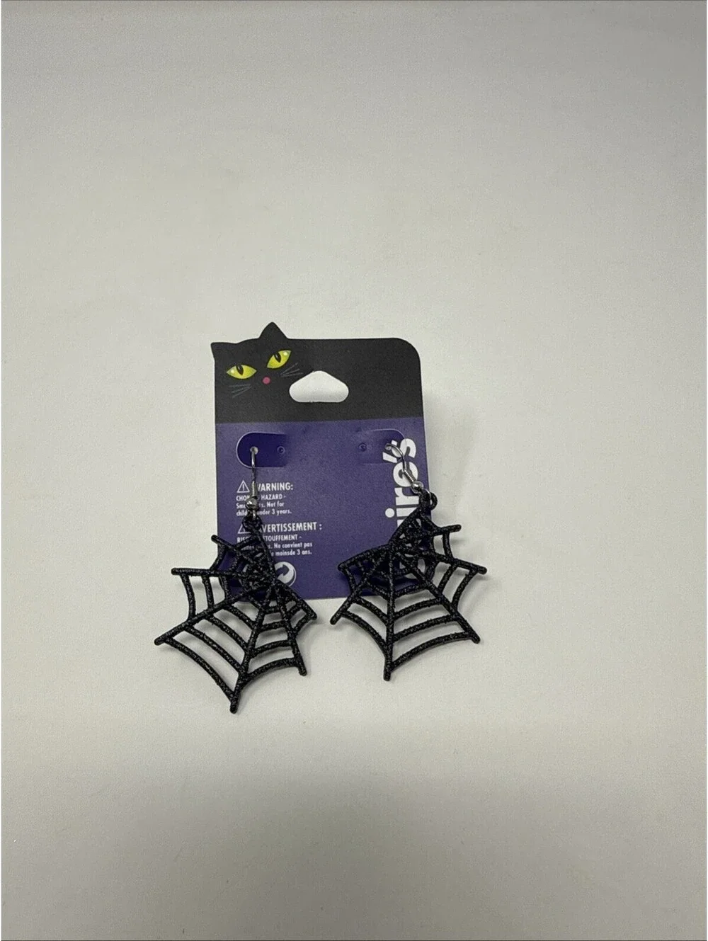 Claire’s Spider Web Earrings